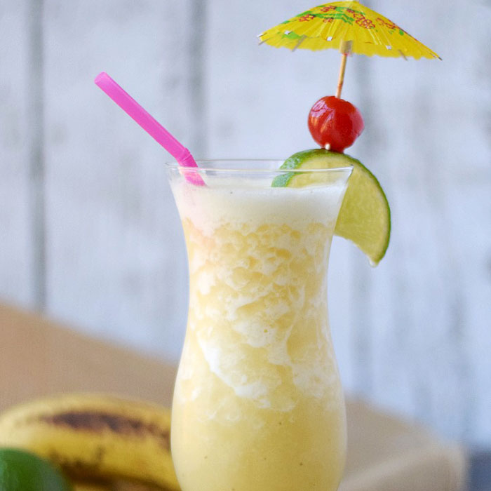 Bananas taste better in the Caribbean, and this creamy caribbean cocktail made with bananas and Caribbean white rum will win you over.